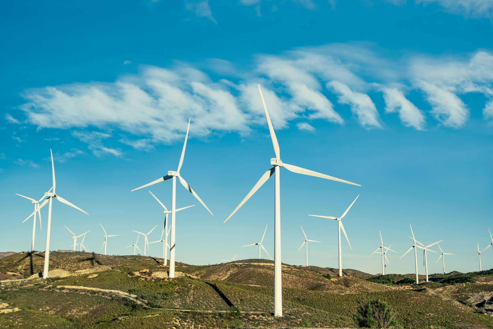 Modern Wind Turbines in Open Landscape