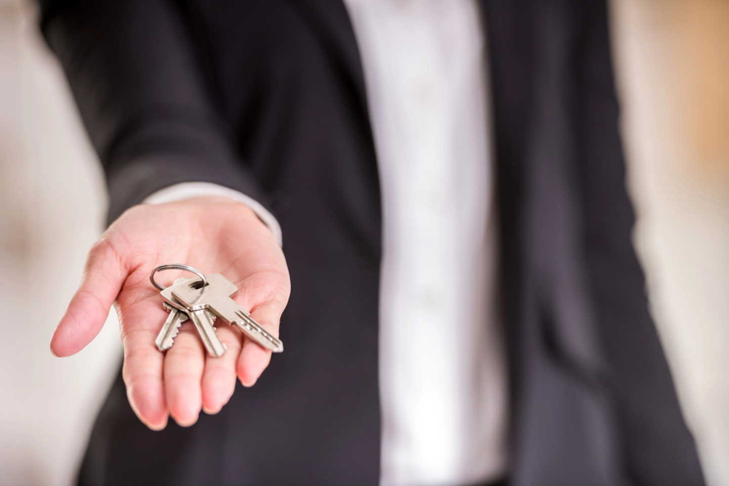 Man Holding Keys