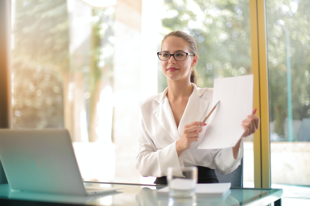 Business Woman Holding a Document