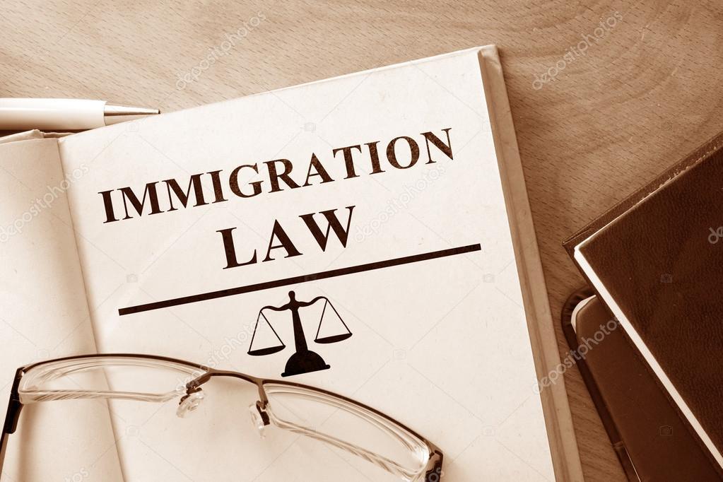 Book with words immigration law